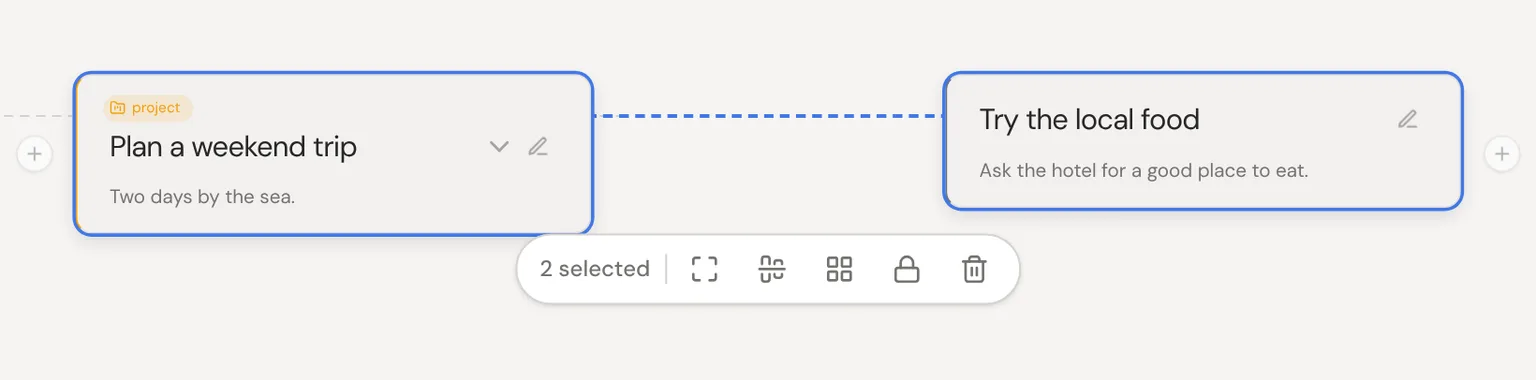 Two selected thoughts, with the group toolbar below them showing fit, align, arrange, lock and delete.